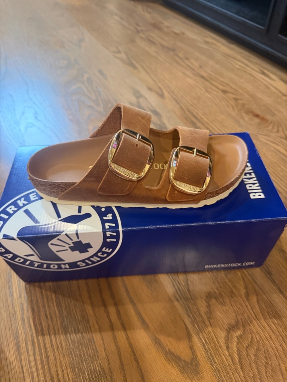 Birkenstocks - women’s brown Birkenstocks with gold buckle brand new